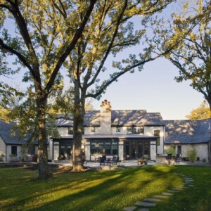 While the house was placed on the wooded site in such a way as to save as many trees as possible, a few were unavoidably lost, but remain an active part of the house as the family’s new custom-built kitchen furniture. Burgess Residence